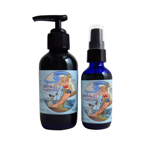 Blue glass bottles of organic body oil with jojoba oil and apricot kernel oil